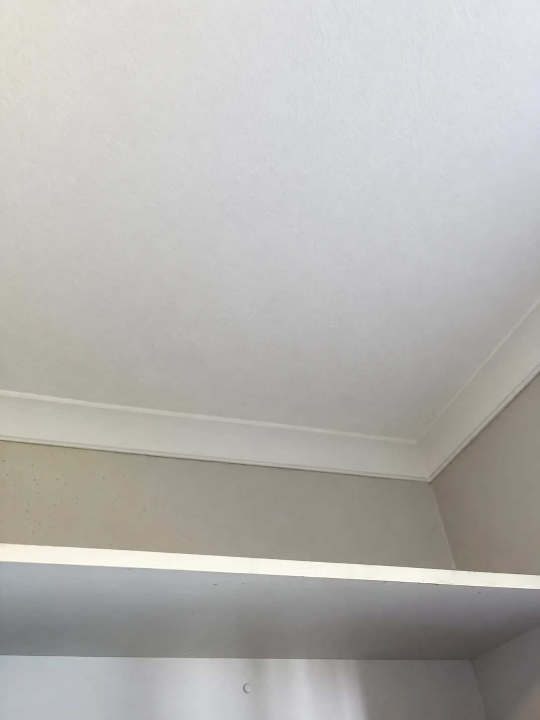 Possible repaired ceiling finish based on the peeling ceiling photo