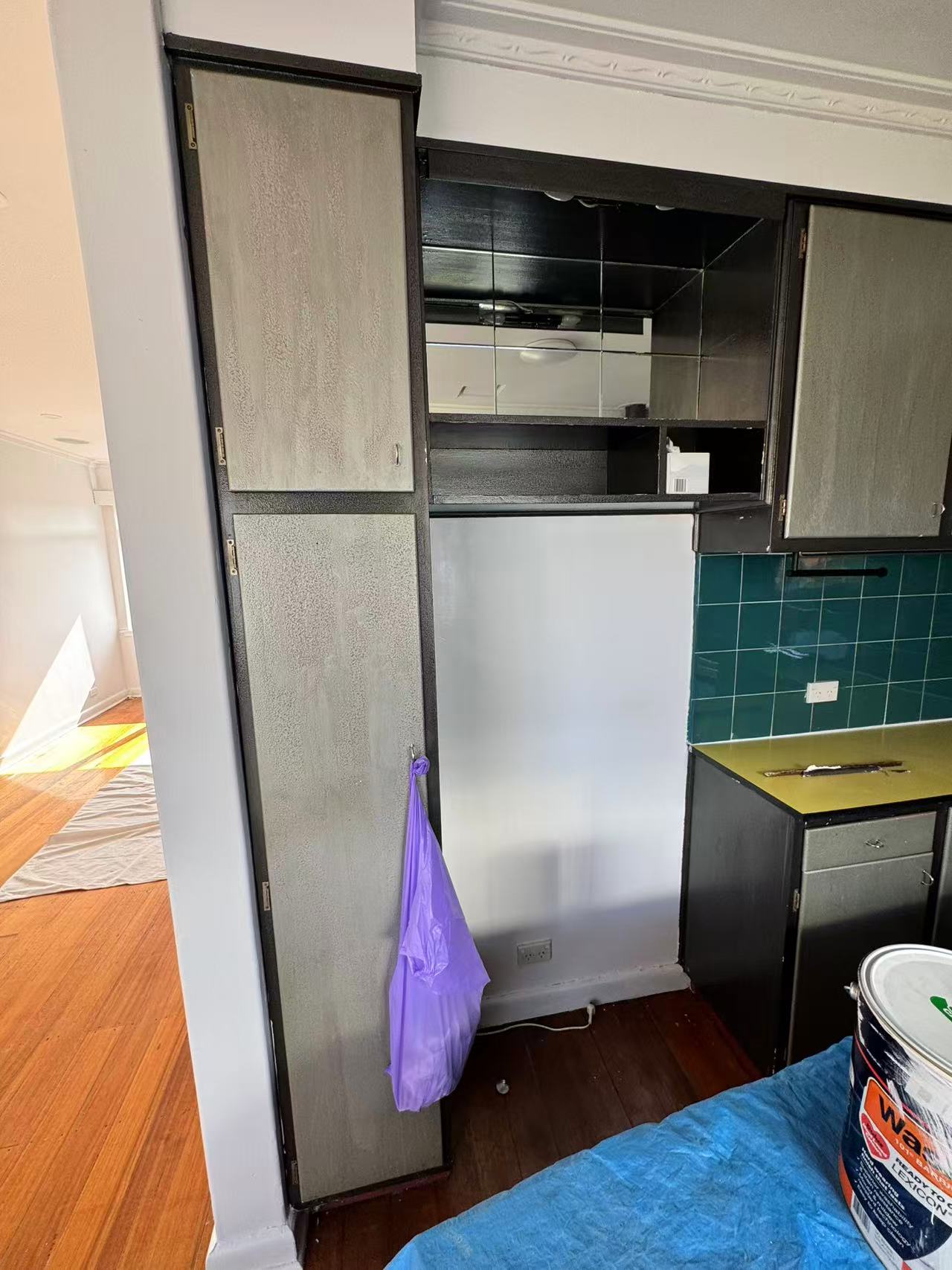 Existing kitchen cabinets, fridge space and tiles